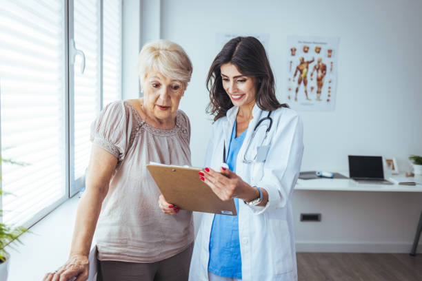 istock The doctor is explaining something on the clipboard 1411627837