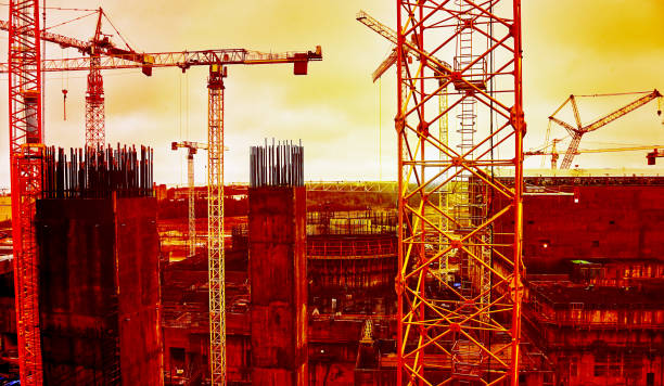 istock Cooling tower of an environmentally friendly nuclear power plant under construction 1411630074
