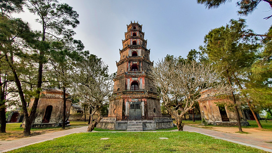 Hue, Vietnam - March 17, 2021 : Phuoc Duyen Tower In Thien Mu Pagoda (Also called Heavenly Lady Pagoda). Thien Mu Pagoda As Long Been One Of The Most Famous Destinations In Hue City.