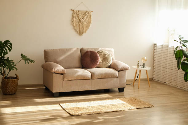 istock Room with couch full of natural light 1411635558