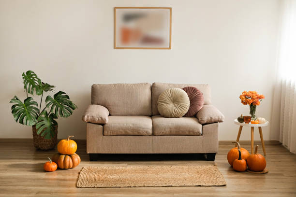 istock Room decorated with pumpkins and candles 1411635640