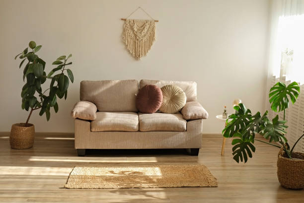 istock Room with couch full of natural light 1411635647