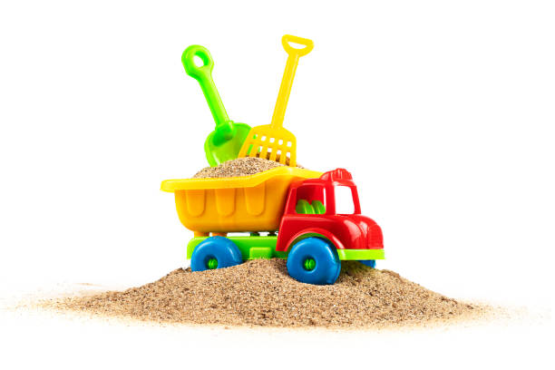 Colorful children's beach toys on white background