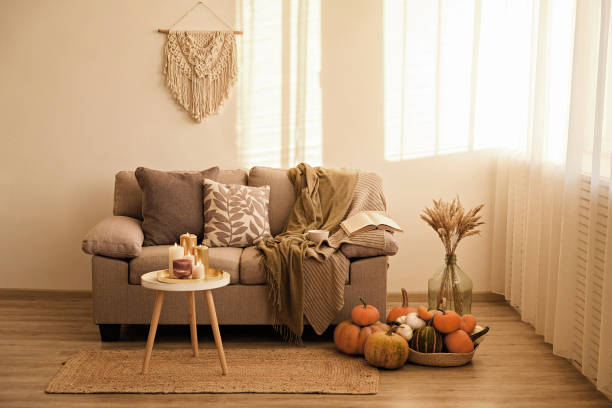 istock Room decorated with pumpkins and candles 1411636081