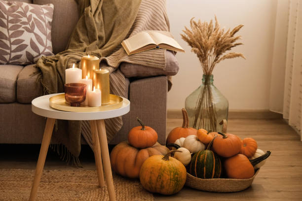 istock Room decorated with pumpkins and candles 1411636111