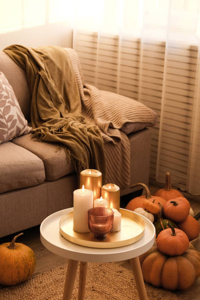 istock Room decorated with pumpkins and candles 1411636190