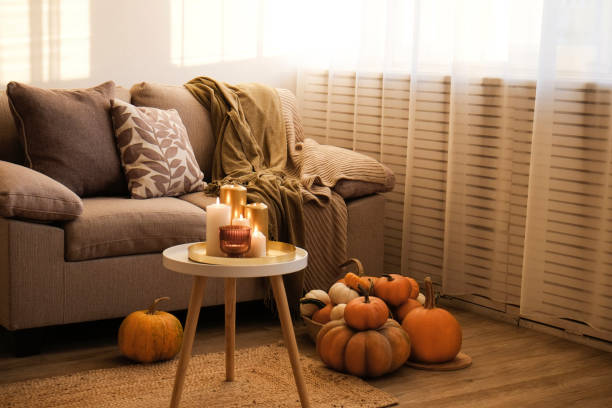 istock Room decorated with pumpkins and candles 1411636211