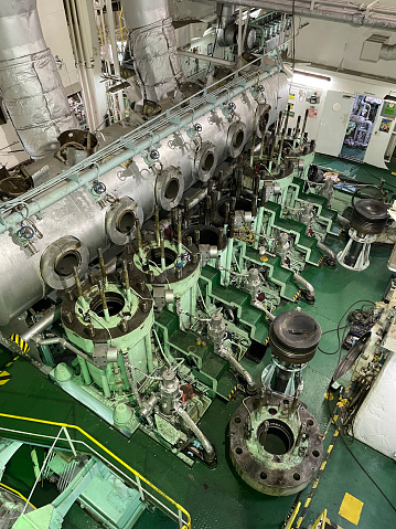 Engine and machine in marine ship. Engine room for drive marine ship. It is diesel engine. Vessel's Main Engine.