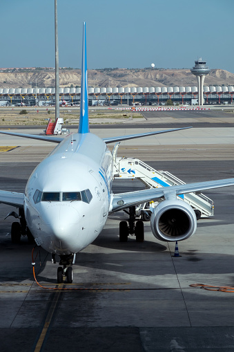 Madrid, Spain - October 19, 2020: Passenger plane at Adolfo Suárez Madrid-Barajas International Airport
