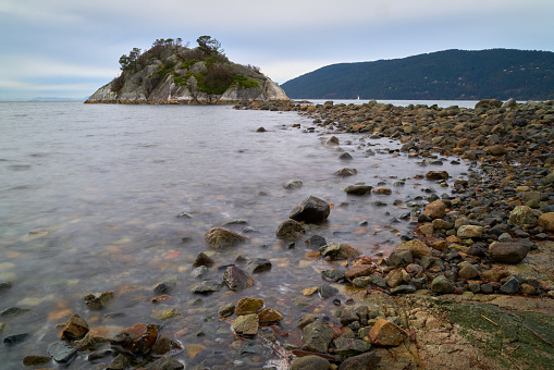 Whyte Island in Whytecliff Park, is accessible for climbing and exploring at low tide. West Vancouver, British Columbia, Canada.