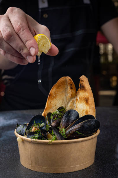 istock mussels in a disposable plate 1411646350