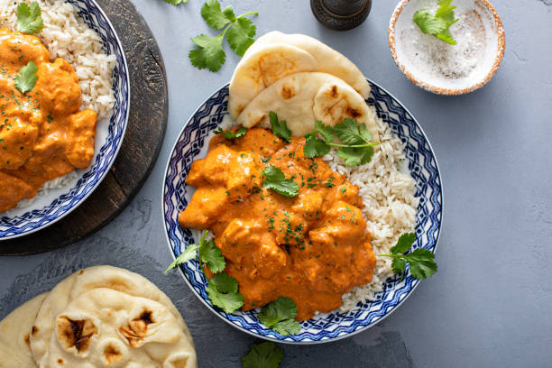 Chicken tikka masala, cooked marinated chicken in spiced curry sauce stock photo