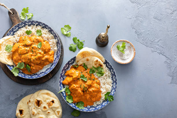 istock Chicken tikka masala, cooked marinated chicken in spiced curry sauce 1411646713
