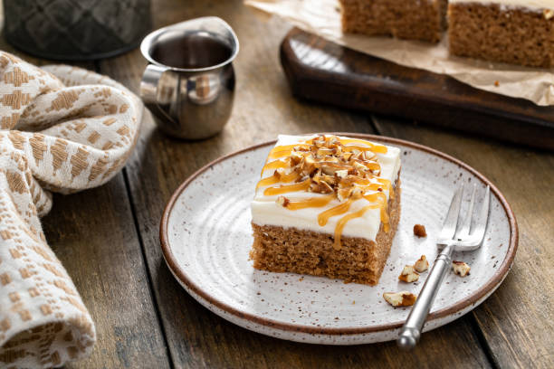 istock Carrot or spice cake with cream cheese frosting 1411646773