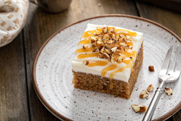 istock Carrot or spice cake with cream cheese frosting 1411646776