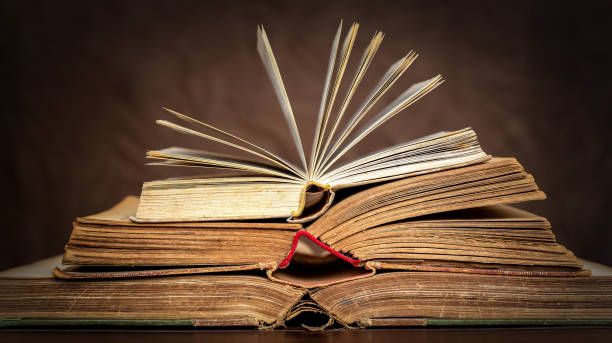 istock Old antique vintage books, back to school background 1411651994