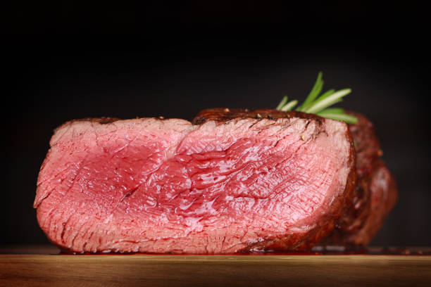 medium rare beef steak on wooden background. - steak grilled beef plate imagens e fotografias de stock