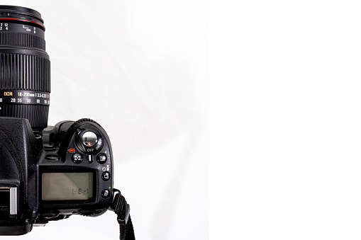 Professional digital camera, isolated on white background