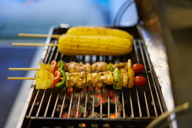 istock barbecue sticks on stove on blur swimming pool background 1411661840