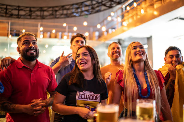 istock Ecuadorian friends watching a soccer game at a bar 1411663082