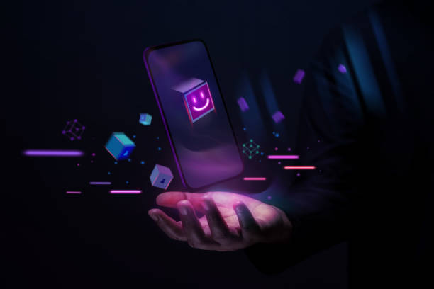 istock Metaverse and Blockchain Technology Concepts. Person with an Experiences of Metaverse Virtual World via Smart Phone. Futuristic Tone. Hand Levitating Mobile Phone 1411663387