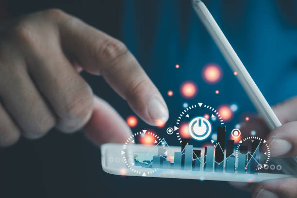 istock Man point to growing graph and modern virtual analyzing finance sales data. 1411666414