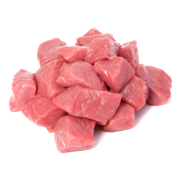 raw chopped beef meat pieces isolated om white background cut out. - meat steak veal beef imagens e fotografias de stock