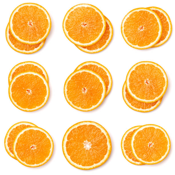 seamless pattern of orange fruit slices. orange slices isolated on white background. food background. flat lay, top view. - orange slices imagens e fotografias de stock