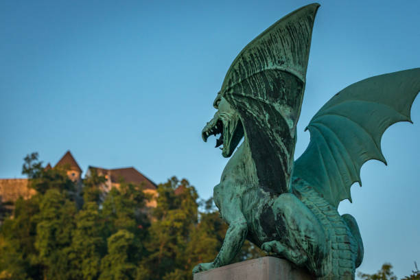 Monuments in the city of Ljubljana, Slovenia Bridges, monuments, dragons, architect Plečnik in Ljubljana, Slovenia, dragon, castle Ljubljana, Slovenia, water reflections, ljubljana castle stock pictures, royalty-free photos & images