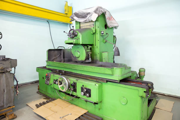 istock Old screw cutting lathe at engineering plant 1411677257