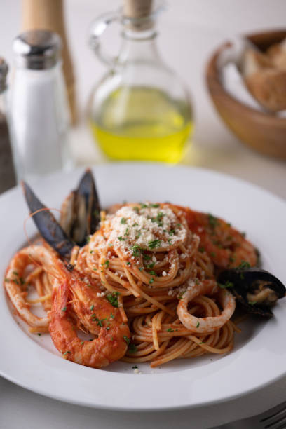 istock Spaghetti alla pescatora, seafood tomato sauce pasta 1411684178