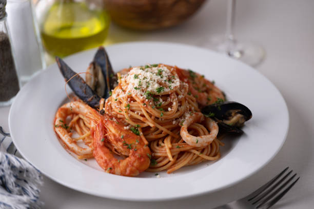 istock Spaghetti alla pescatora, seafood tomato sauce pasta 1411685418