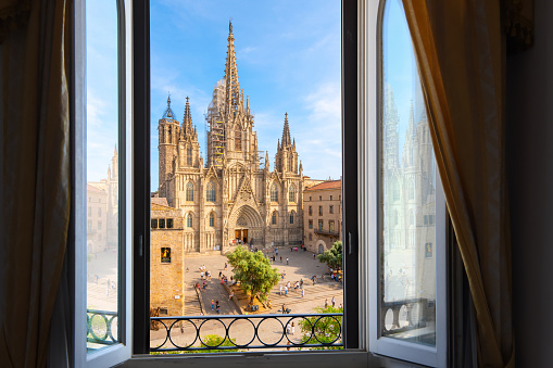 View through a window of the Barcelona Cathedral in the historic center of Barcelona, Spain.