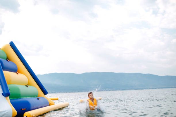istock Kid having fun in Water Park 1411695960