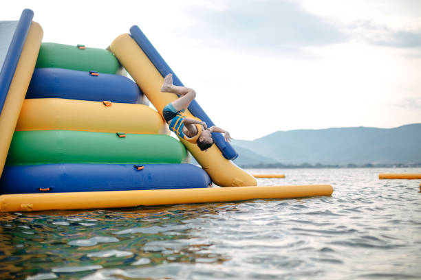 istock Kid having fun in Water Park 1411696571