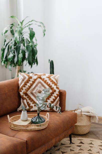 istock Breakfast tray on sofa in living room 1411702972