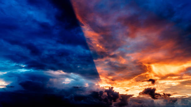 Battle between day and night Cloud shadow, sunset above Amersfoort, the Netherlands day and night stock pictures, royalty-free photos & images