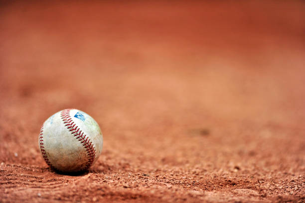 baseball on dirt gravel - baseballs imagens e fotografias de stock