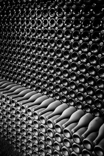 Three clipping paths: bottle + label inside + label outside. Isolated on black.