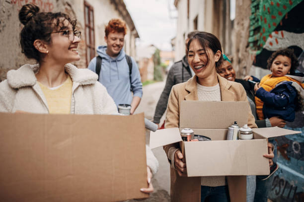istock Street artists carrying boxes 1411718131
