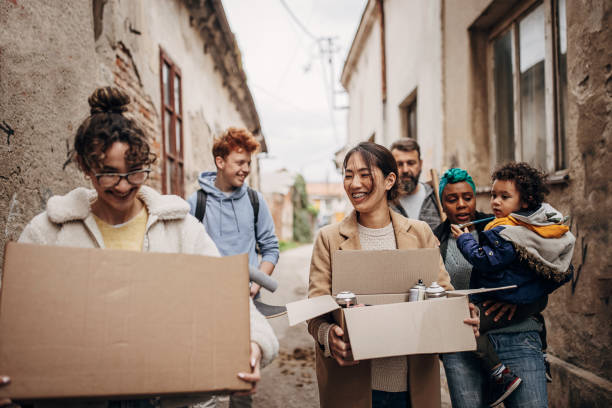 istock Street artists carrying boxes 1411718138