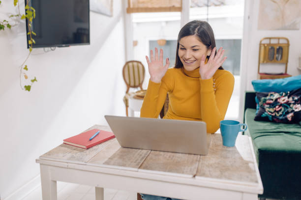 istock Young teacher working with school children online 1411727210