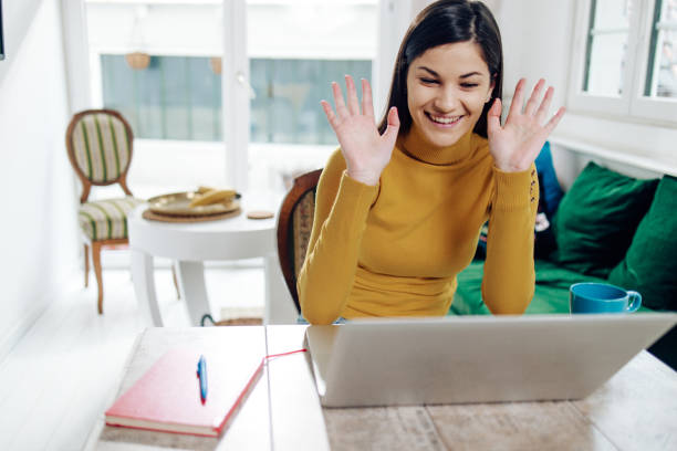 istock Beautiful entrepreneur working with online clients 1411727218