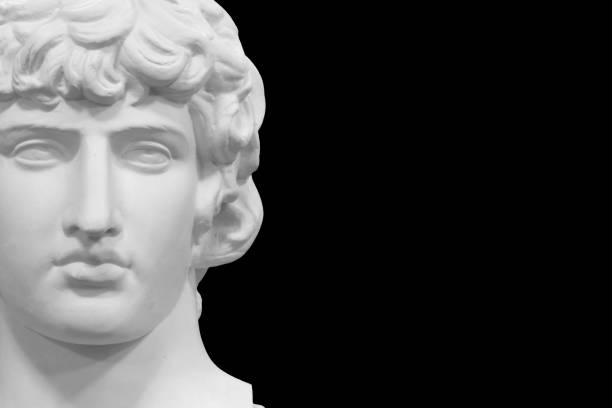 istock white plaster male statue isolated on black background 1411727369