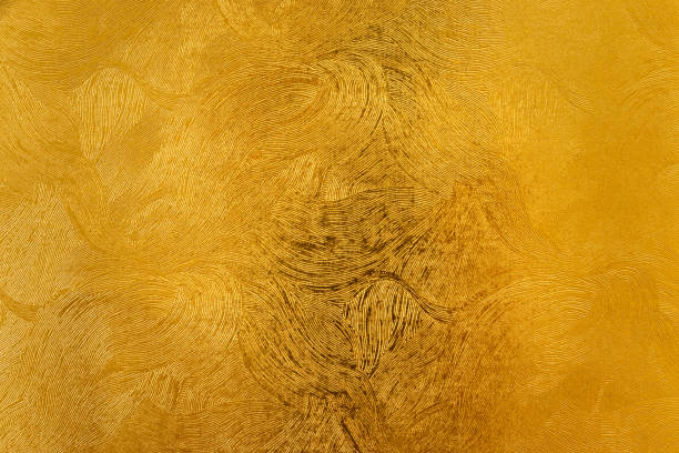 istock Golden paper with fine curved pattern on the surface 1411733441