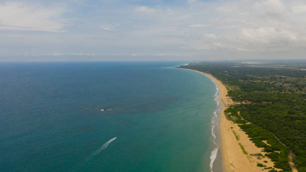 Sandy beach and turquoise water. Sri Lanka. stock photo