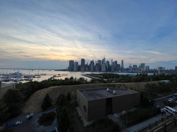 istock Manhattan view at sunset time at New York 1411746412