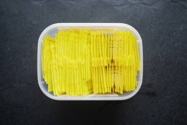 istock Sugar Substitute sweetener on a black background . 1411747760