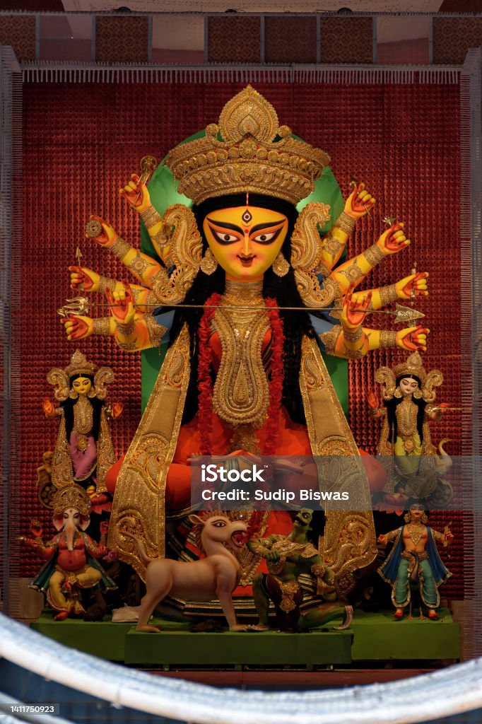 Goddess Durga devi idol decorated at puja pandal in Kolkata, West Bengal, India. Durga Puja is biggest religious festival of Hinduism and is now celebrated worldwide. Durga Stock Photo