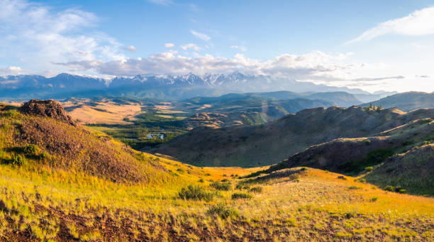 istock Bright autumn Kurai steppe landscape. Steppe on the background of mountains. Panoramic view, Altai region. 1411756592